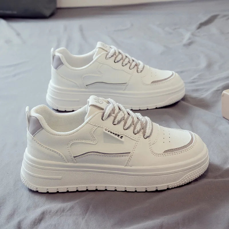 tenis feminino branco e cinza